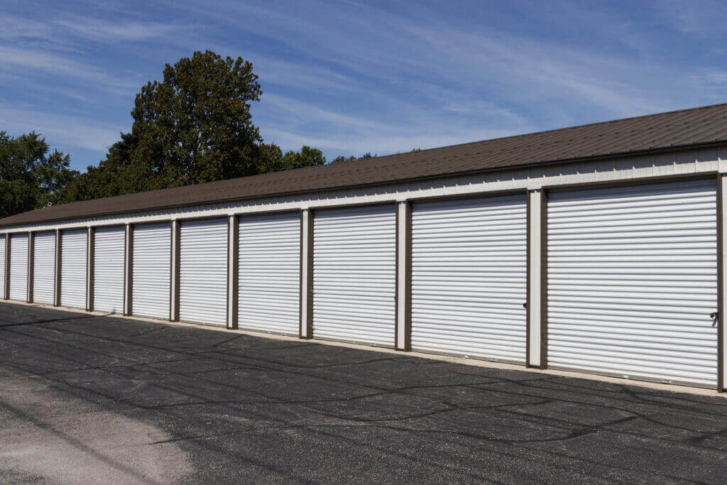Organized 5×5 self storage unit filled with labeled boxes and home accessories at McDowell Mountain Community Storage in Scottsdale Arizona