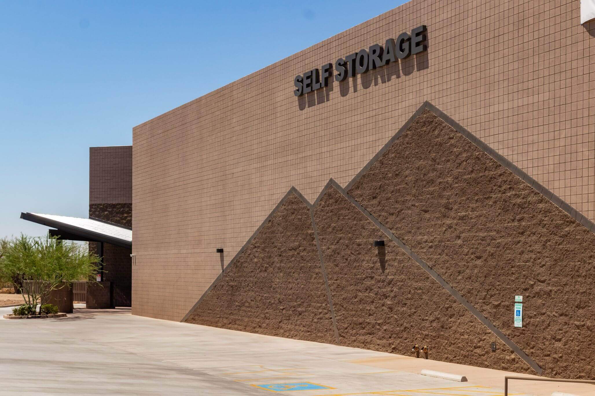 A homeowner organizing belongings while using McDowell Mountain Community Storage in Scottsdale, Arizona to downsize their home